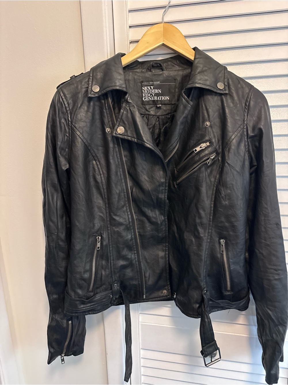 Urban Behavior Black Faux Leather Moto Jacket with Belted Hem